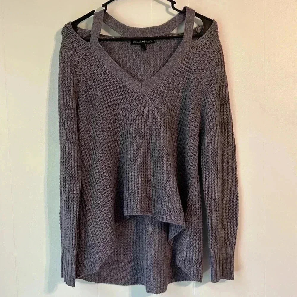 Size large sweater. Preowned condition‎ purple